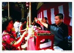 Worshiper with Shinto priest