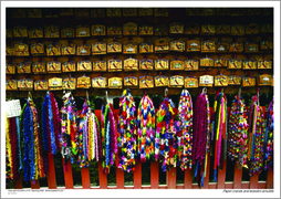 Paper cranes and wooden amulets